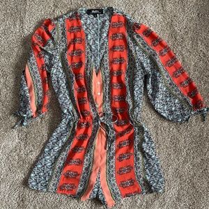 LuLu's Romper (Medium), but fits like a small.